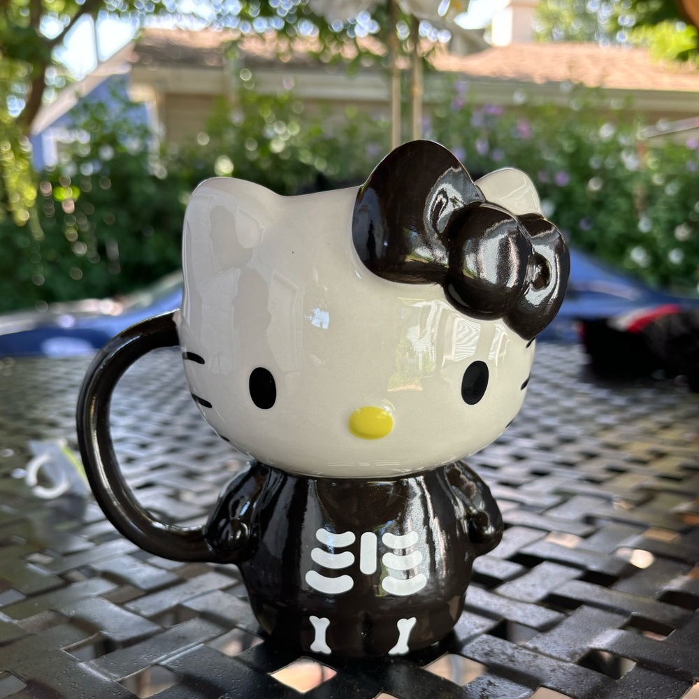 SOLD Hello Kitty Black Skeleton Mug ☕️💀